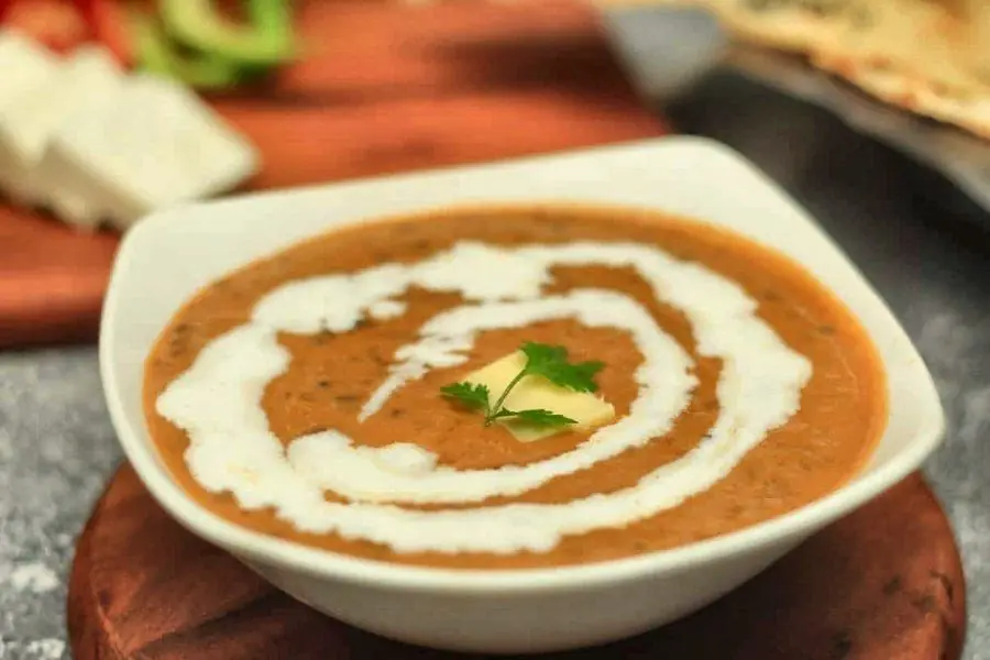 A bowl of creamy dal makhani served at Temptation, Agra
