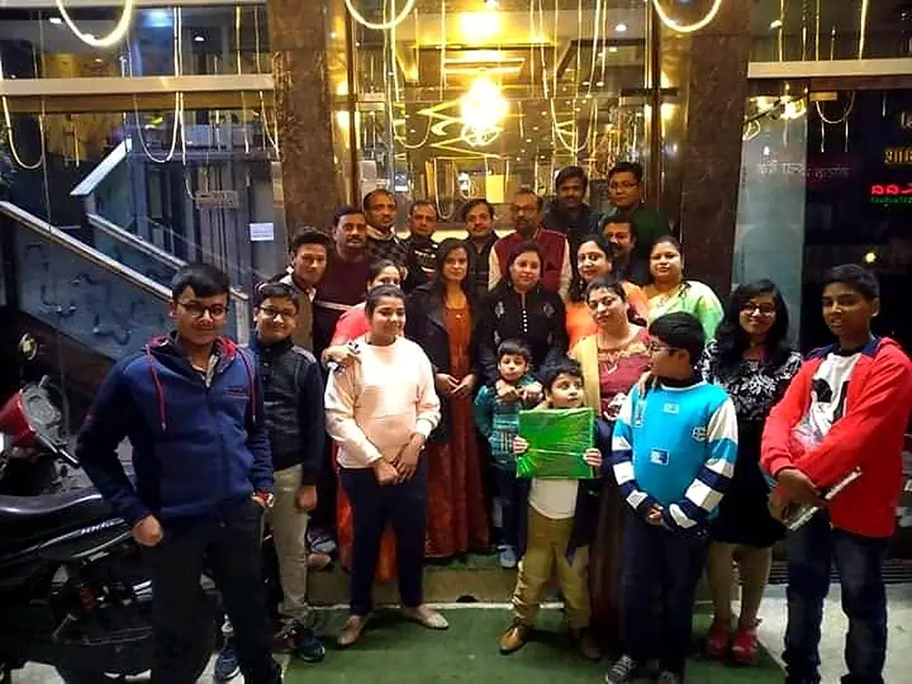 A family celebrating at Temptation